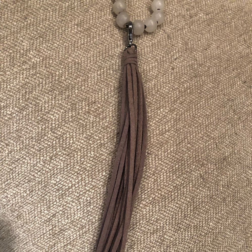 Boutique white beaded necklace w/gray tassel